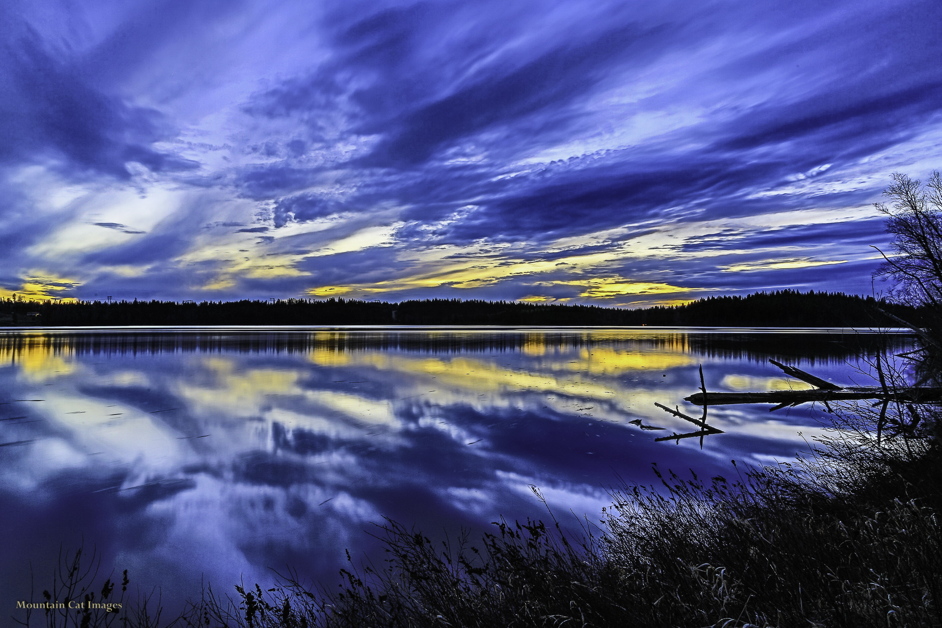 Sunset reflected in Ten Mile Lake — HDR-processed photograph
